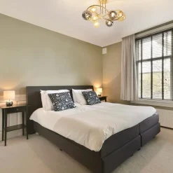 Straluma Art Deco plafondlamp goud met smoke en amber glas></noscript> Plafondlampen|Woonkamerlampen