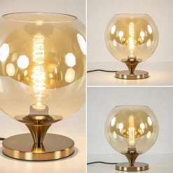 Straluma Elegante tafellamp donker goud met amber glazen bol 25 cm><noscript><img width=