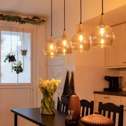 Straluma 4-Lichts eettafelhanglamp zwart/goud met amber glazen bollen></noscript> Eettafellampen|Pendel Lampen