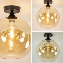 Straluma Mat zwarte plafondlamp met amber glazen bol 30 cm><noscript><img width=