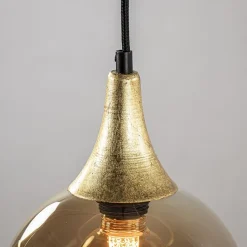 Straluma Ronde 3-lichts hanglamp zwart met goud en amber glas></noscript> Eettafellampen|Pendel Lampen